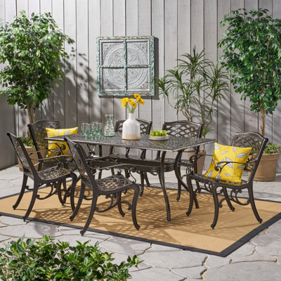 Lebanon 9 piece dining set with cushions best sale